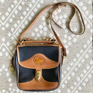 Dooney & Bourke All Weather Leather Carrier